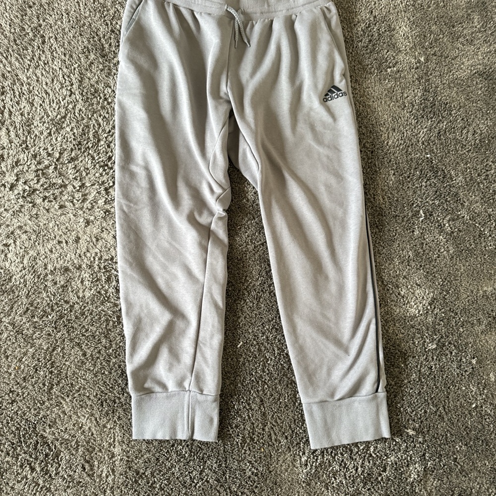 Adidas grey joggers with black logo